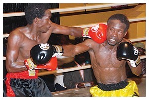 Mudde Ntambi (left) on his way to a unanimous decision victory over Sonny Kalule!